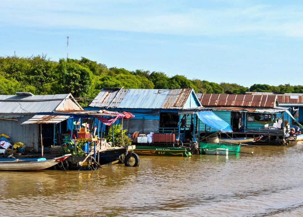 Stilted houses and markets on the bank of the Mekong River.