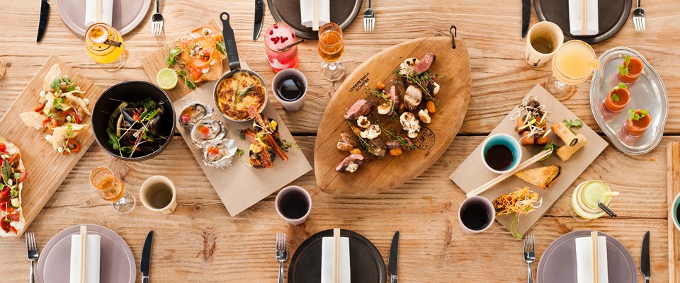 An aerial view of PotLuck Club's table.