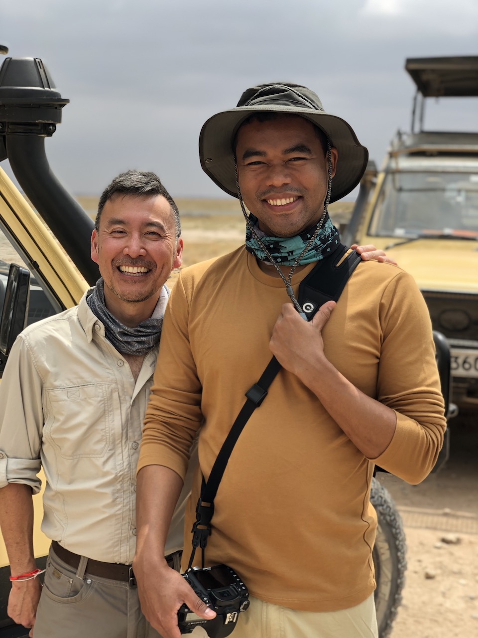 Two travellers in Kenya pose for a picture.